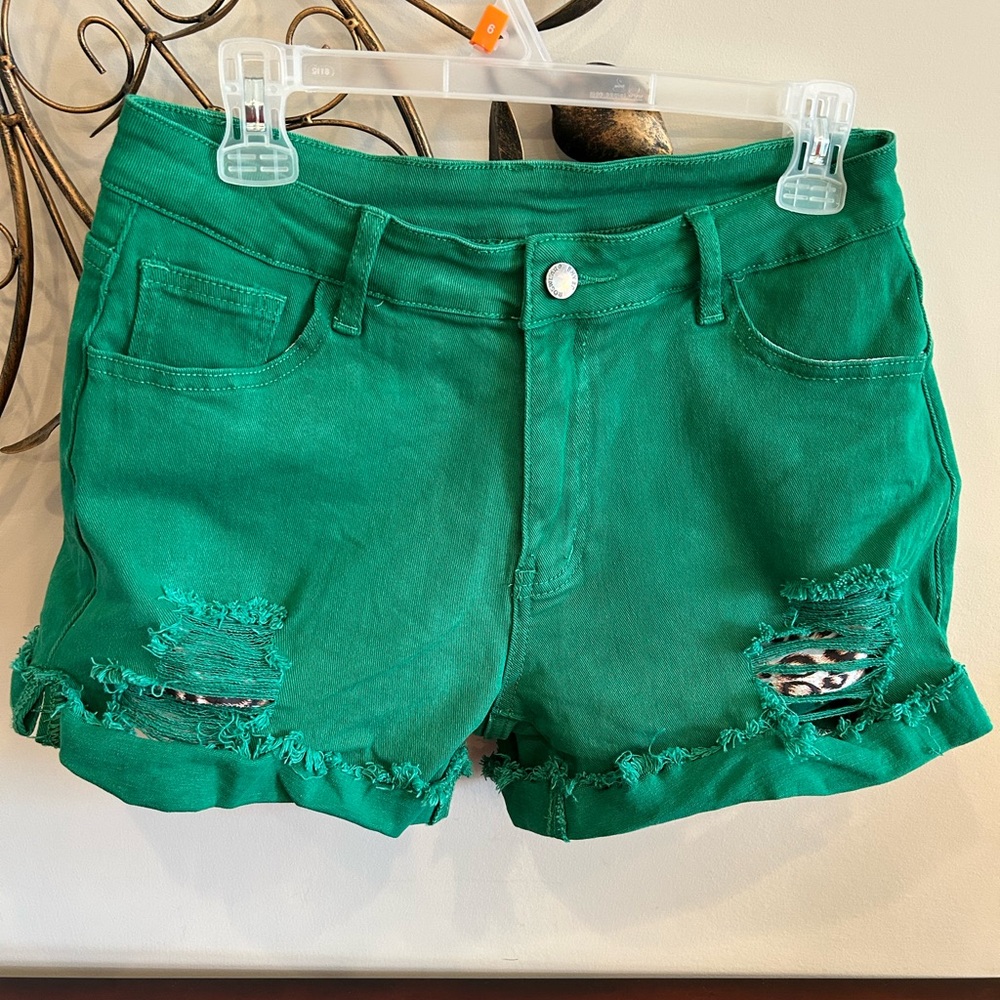 Green Distressed Women Shorts with Animal Print Pockets by Roswear